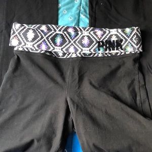 Black VS yoga pants with design at the top